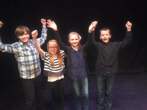 George Spence (far left) celebrating his win with fellow young fiddlers. 